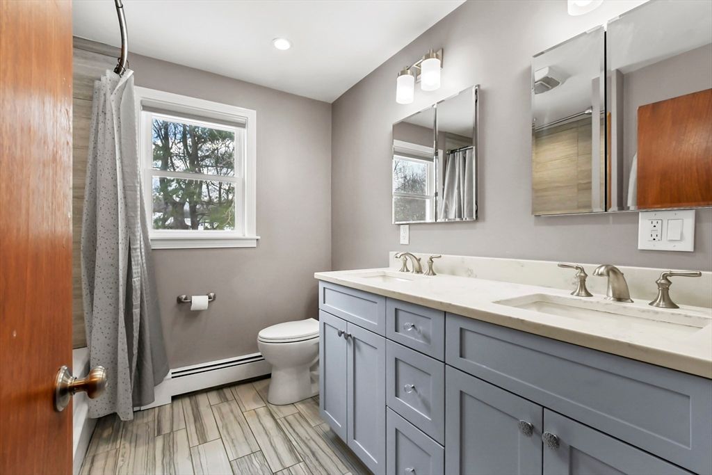Bathroom, Dual Sink Vanities, Interior, Recessed Lighting, Wood Texture Flooring