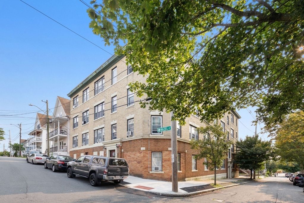 Exterior, Facade, Brick Facade, Condo Building