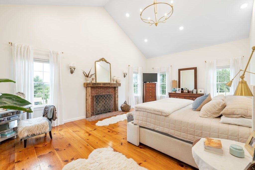 Bedroom, Fireplace, Interior, Pendant Lights, Recessed Lighting, Wood Texture Flooring