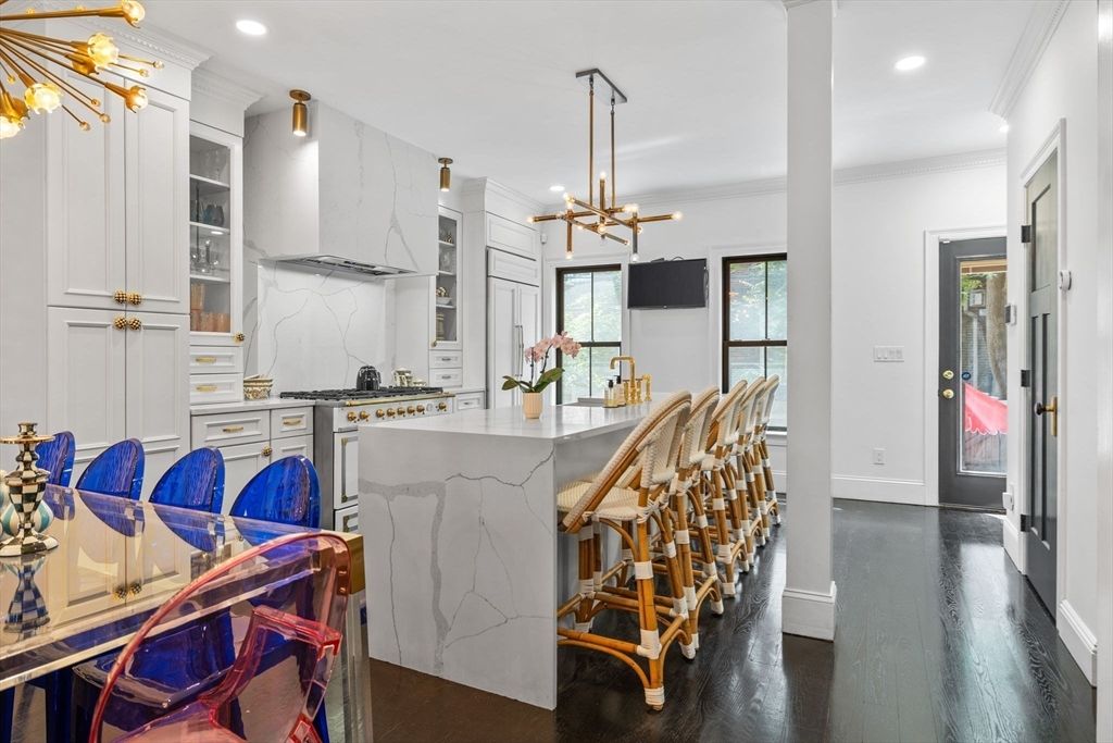 Interior, Kitchen, Marble Walls, Pendant Lights, Recessed Lighting, Stainless Steel Appliances, Wood Texture Flooring