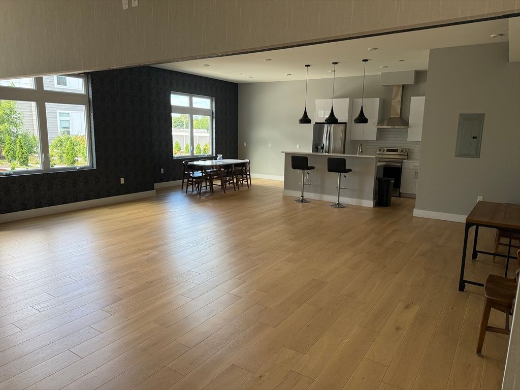 Dining room, Interior, Kitchen, Pendant Lights, Recessed Lighting, Stainless Steel Appliances, Wood Texture Flooring