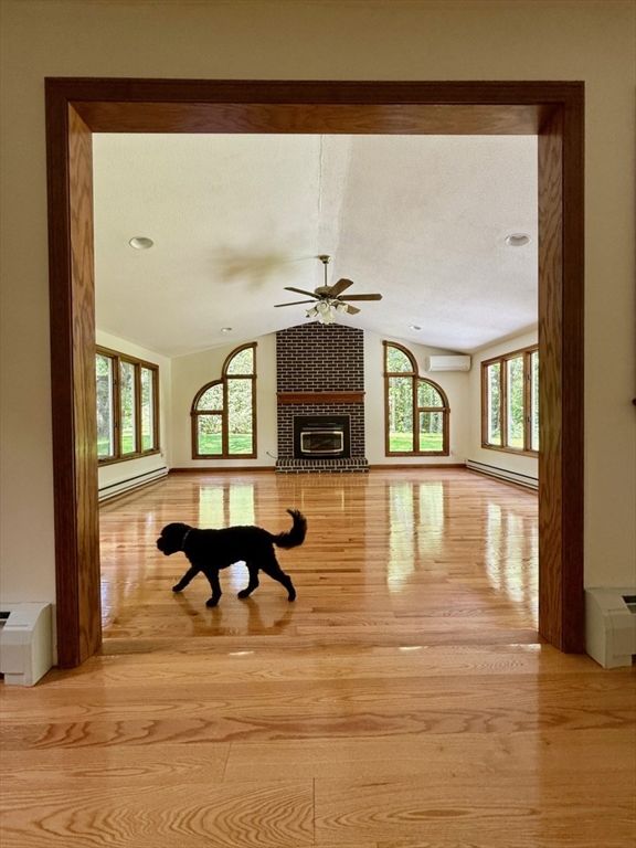 Empty room, Fireplace, Interior, Recessed Lighting, Wood Texture Flooring
