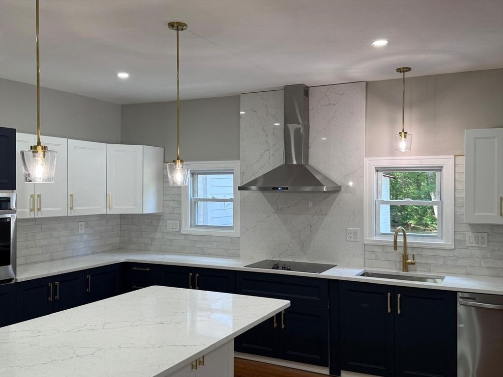 Interior, Kitchen, Marble Walls, Pendant Lights, Recessed Lighting, Stainless Steel Appliances, Wood Texture Flooring