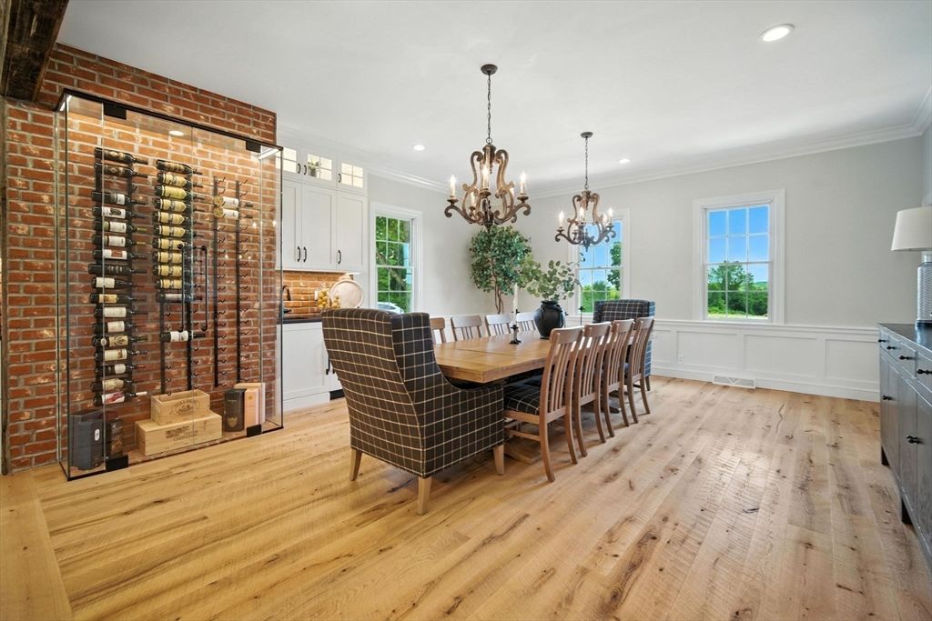 Chandelier, Dining room, Interior, Recessed Lighting, Stone Walls, Wine Storage, Wood Texture Flooring