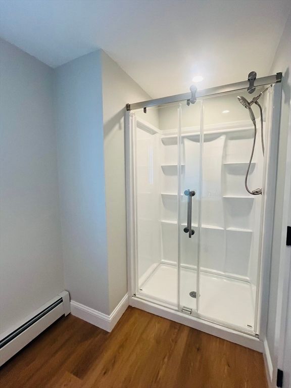 Bathroom, Glass Shower, Interior, Recessed Lighting, Walk-in Closets, Wood Texture Flooring