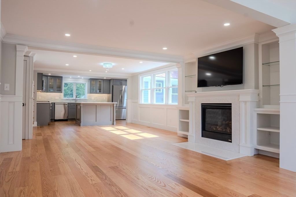 Fireplace, Interior, Kitchen, Recessed Lighting, Stainless Steel Appliances, Wood Texture Flooring