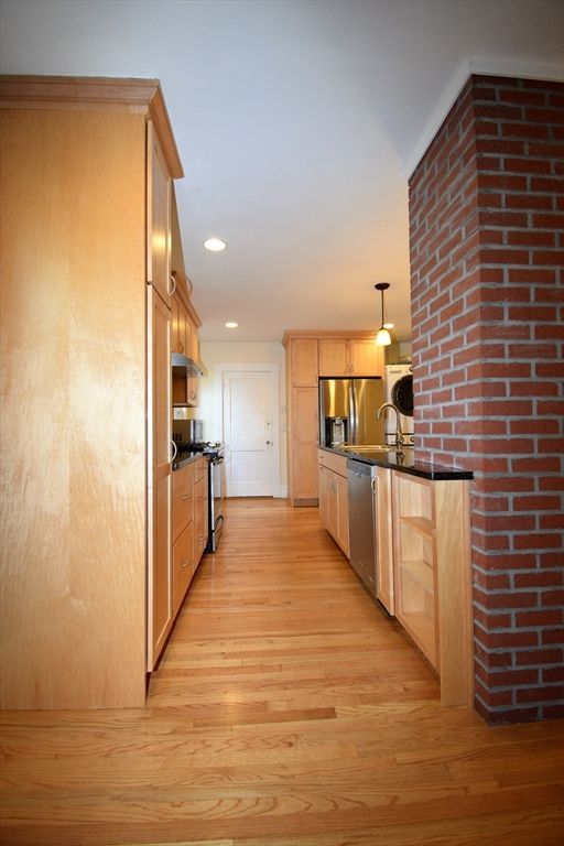 Interior, Kitchen, Pendant Lights, Recessed Lighting, Stainless Steel Appliances, Stone Walls, Wood Texture Flooring