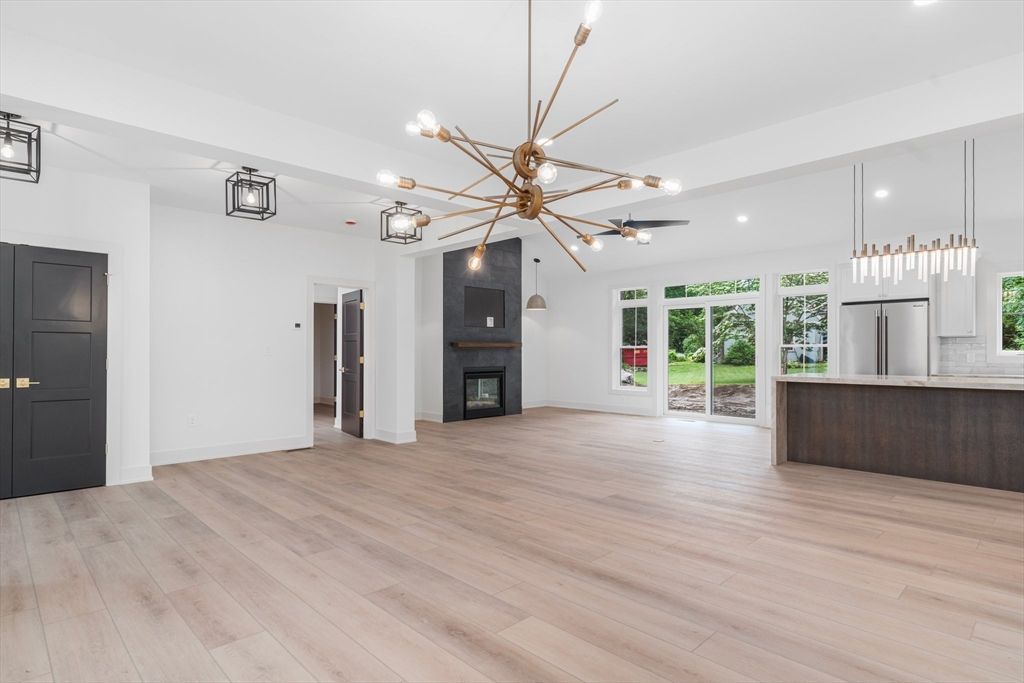 Empty room, Fireplace, Interior, Pendant Lights, Recessed Lighting, Wood Texture Flooring