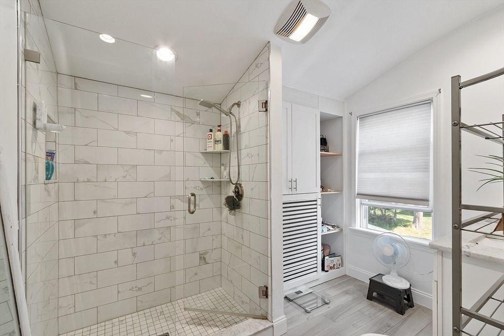 Bathroom, Glass Shower, Interior, Marble Walls, Recessed Lighting, Wood Texture Flooring