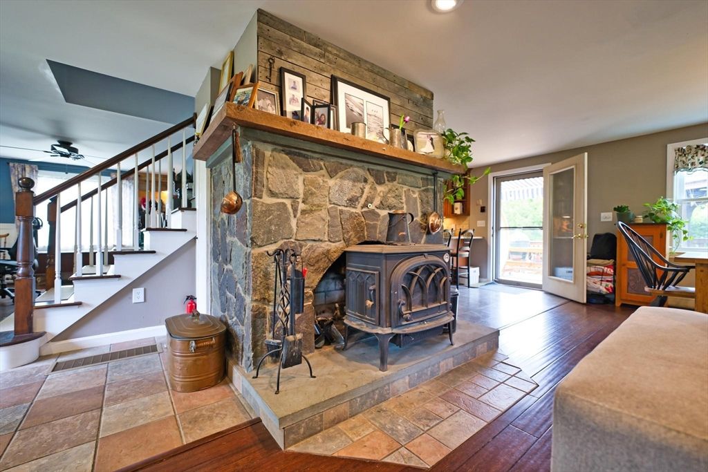 Fireplace, Interior, Recessed Lighting, Stone Walls, Wood Texture Flooring