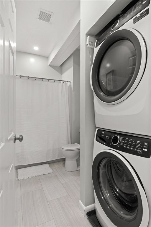 Bathroom, Interior, Recessed Lighting, Washer, Wood Texture Flooring