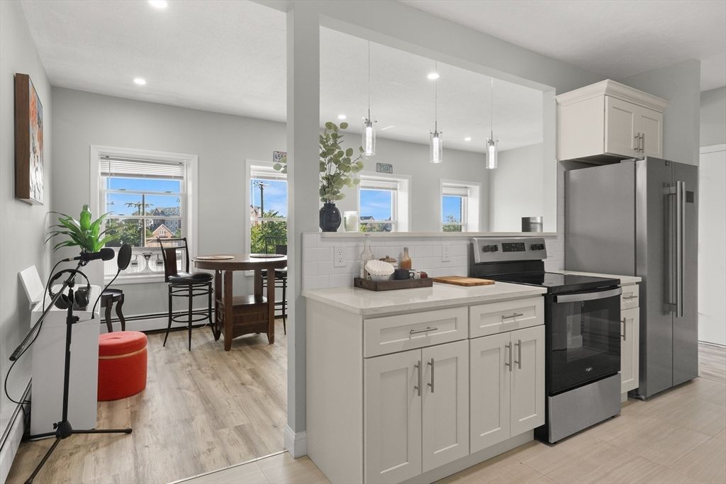 Interior, Kitchen, Pendant Lights, Recessed Lighting, Stainless Steel Appliances, Wood Texture Flooring