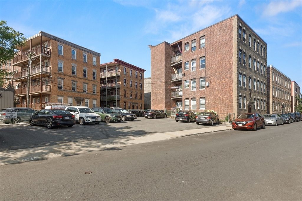 Exterior, Facade, Brick Facade, Condo Building