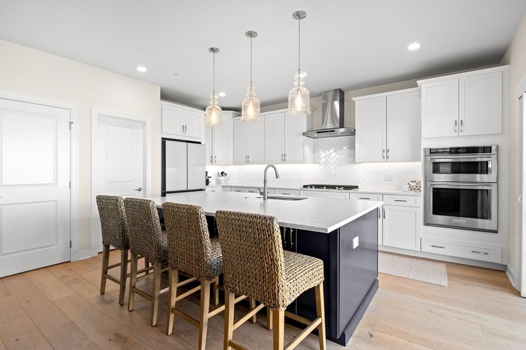 Interior, Kitchen, Pendant Lights, Recessed Lighting, Stainless Steel Appliances, Wood Texture Flooring