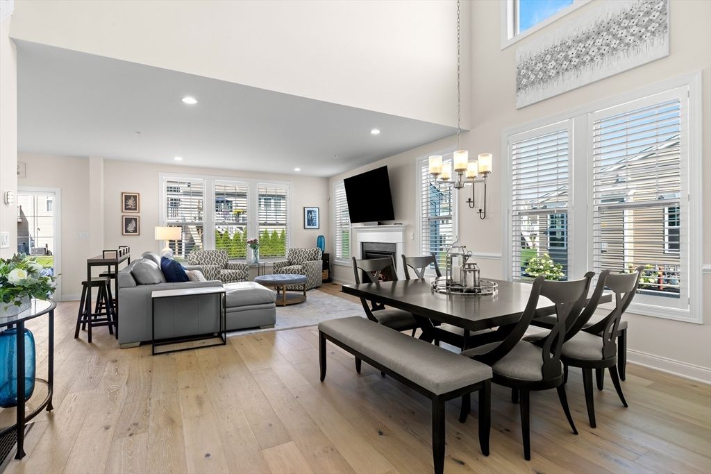 Chandelier, Dining room, Fireplace, Interior, Living room, Recessed Lighting, Wood Texture Flooring