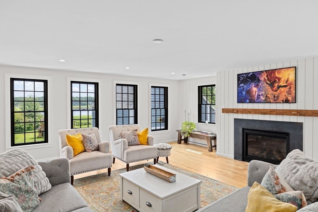 Fireplace, Interior, Living room, Recessed Lighting, Water, Wood Texture Flooring