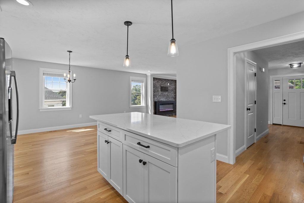 Fireplace, Interior, Kitchen, Pendant Lights, Recessed Lighting, Wood Texture Flooring