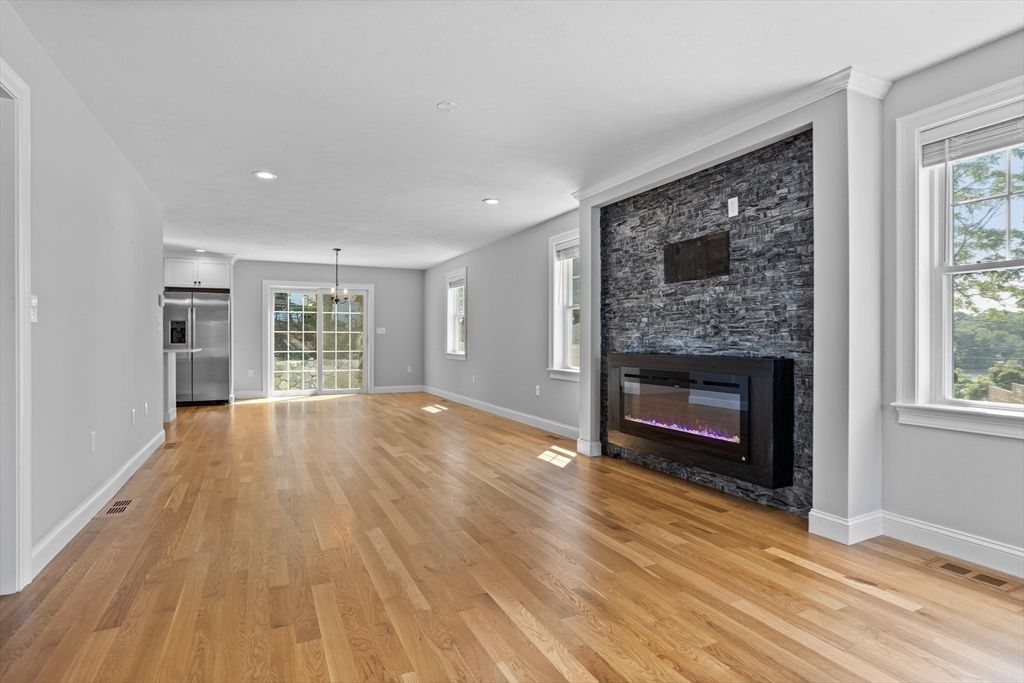 Empty room, Fireplace, Interior, Kitchen, Pendant Lights, Recessed Lighting, Wood Texture Flooring