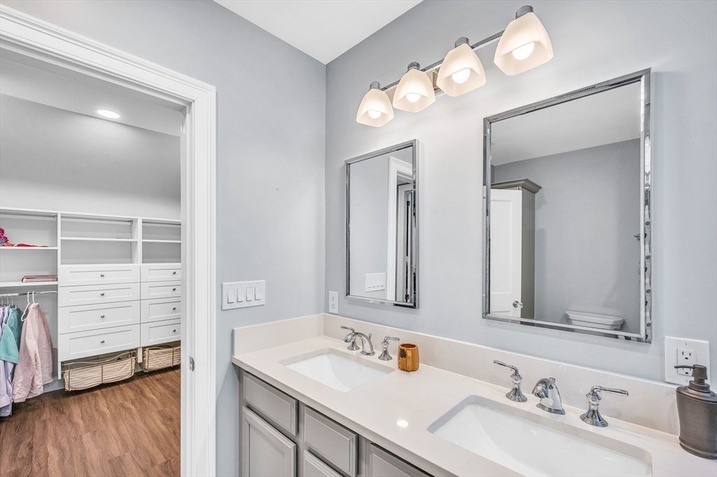 Bathroom, Dual Sink Vanities, Interior, Recessed Lighting, Walk-in Closets, Wood Texture Flooring