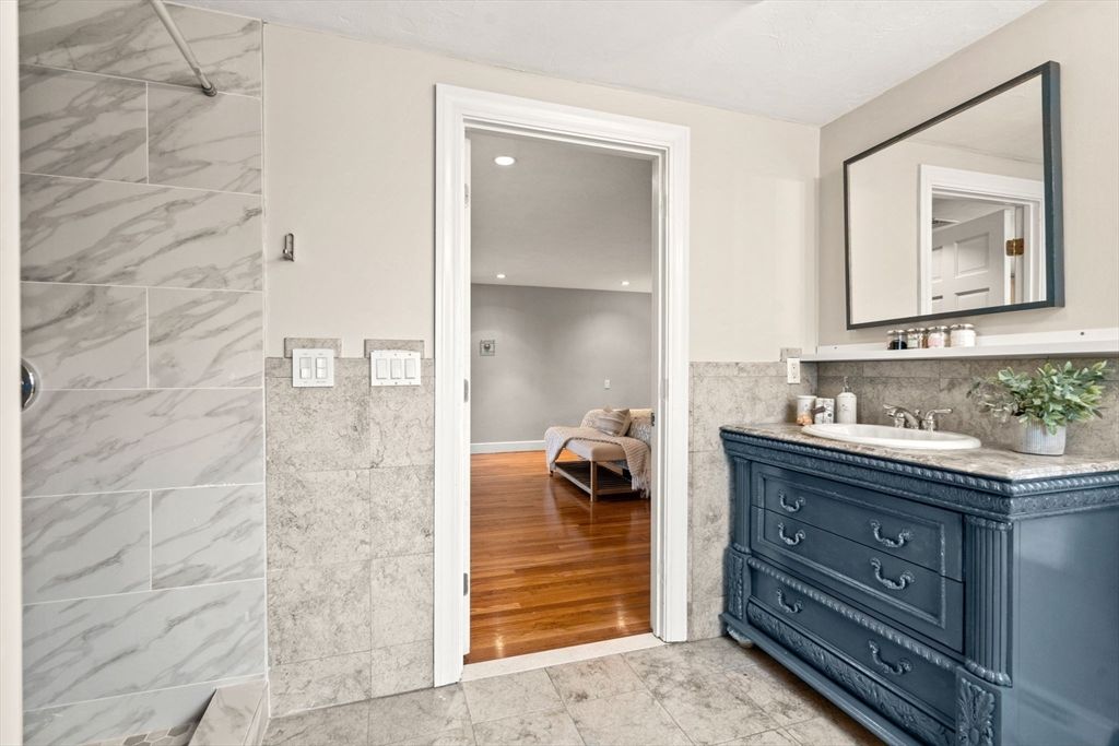 Bathroom, Interior, Marble Walls, Recessed Lighting, Wood Texture Flooring