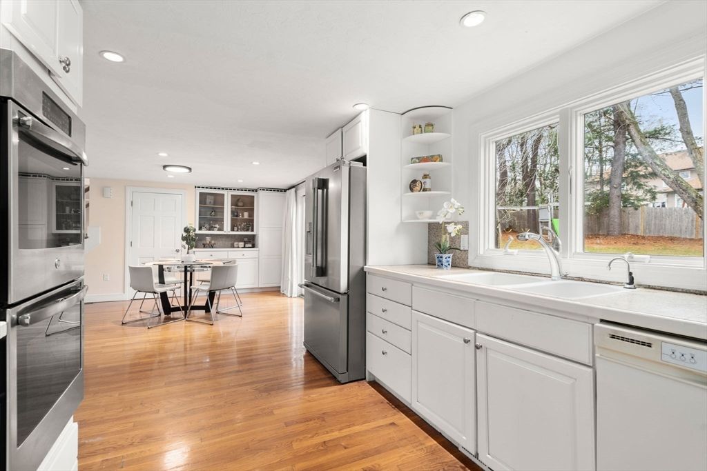 Dining room, Interior, Kitchen, Recessed Lighting, Stainless Steel Appliances, Wood Texture Flooring