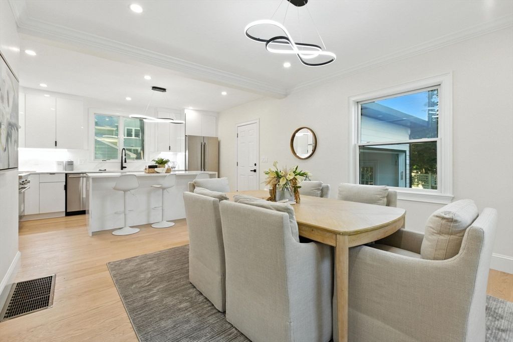 Dining room, Interior, Kitchen, Pendant Lights, Recessed Lighting, Stainless Steel Appliances, Wood Texture Flooring