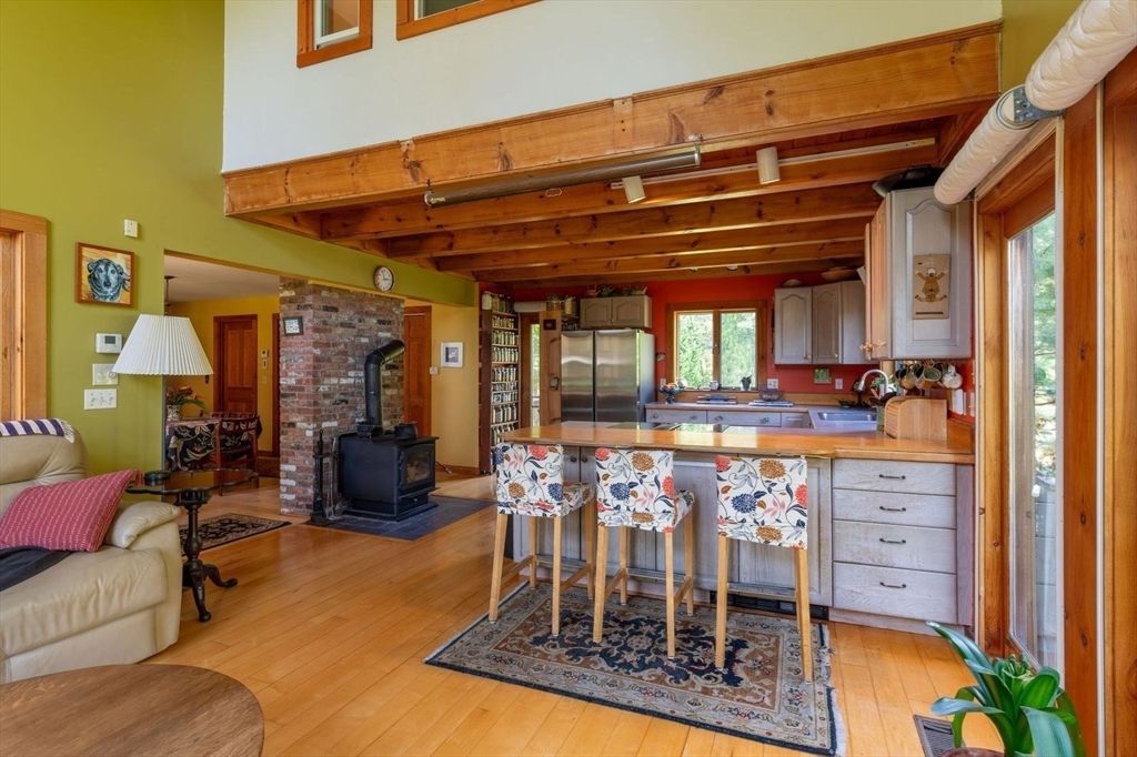 Fireplace, Interior, Kitchen, Stainless Steel Appliances, Stone Walls, Wooden Beams, Wooden Ceilings, Wood Texture Flooring