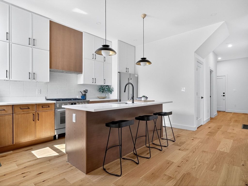 Interior, Kitchen, Pendant Lights, Recessed Lighting, Stainless Steel Appliances, Wood Texture Flooring