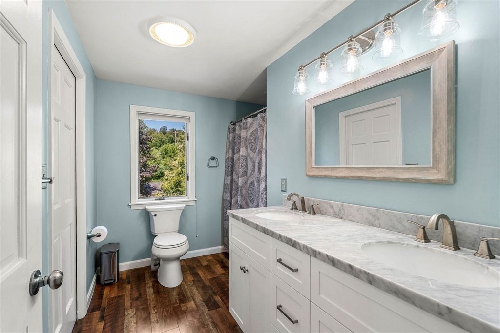 Bathroom, Dual Sink Vanities, Interior, Recessed Lighting, Wood Texture Flooring