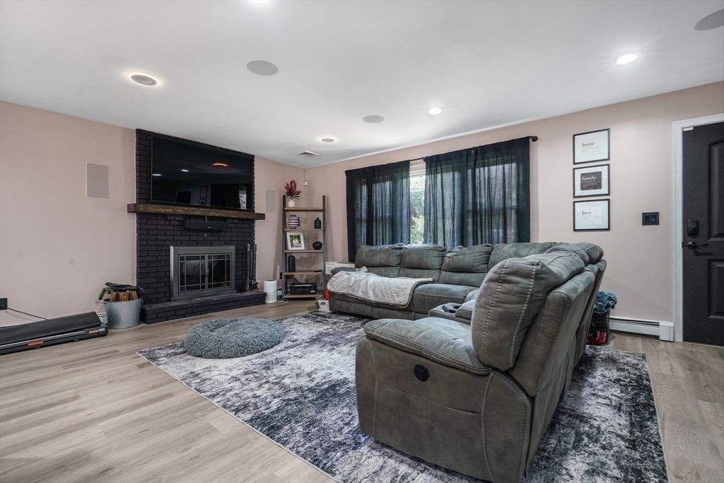 Fireplace, Interior, Living room, Recessed Lighting, Wood Texture Flooring