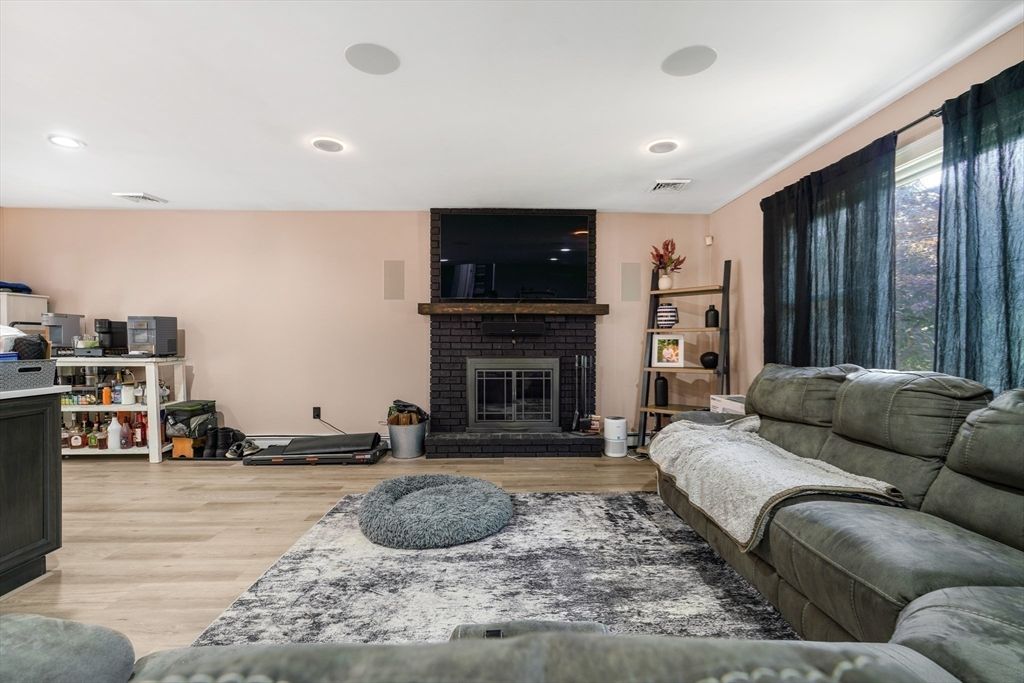 Fireplace, Interior, Living room, Recessed Lighting, Wood Texture Flooring