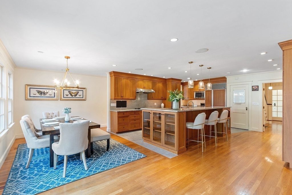 Dining room, Interior, Kitchen, Pendant Lights, Recessed Lighting, Stainless Steel Appliances, Wood Texture Flooring