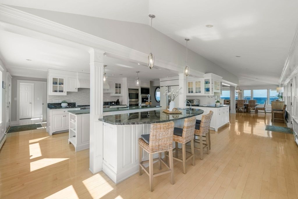 Dining room, Interior, Kitchen, Pendant Lights, Recessed Lighting, Stainless Steel Appliances, Water, Wood Texture Flooring