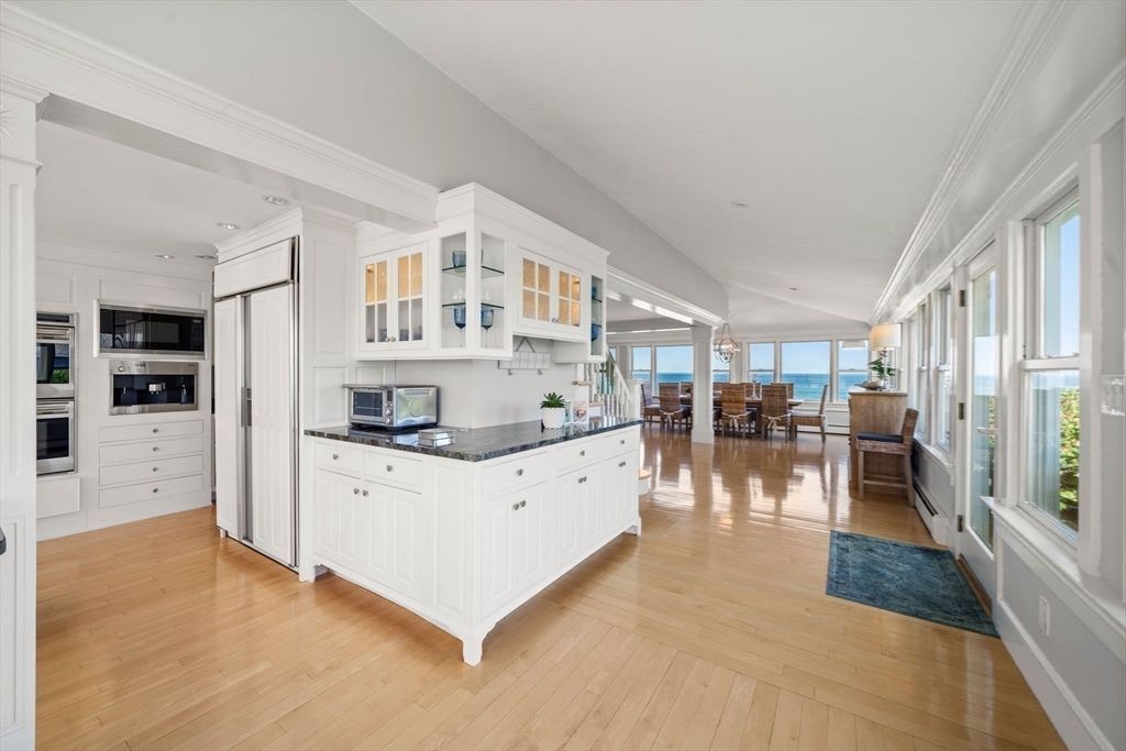 Dining room, Interior, Kitchen, Recessed Lighting, Stainless Steel Appliances, Water, Wood Texture Flooring