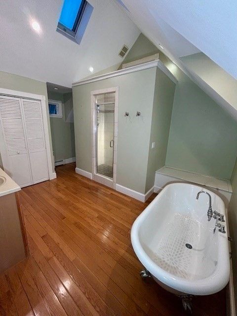 Bathroom, Free Standing Baths, Interior, Recessed Lighting, Wood Texture Flooring