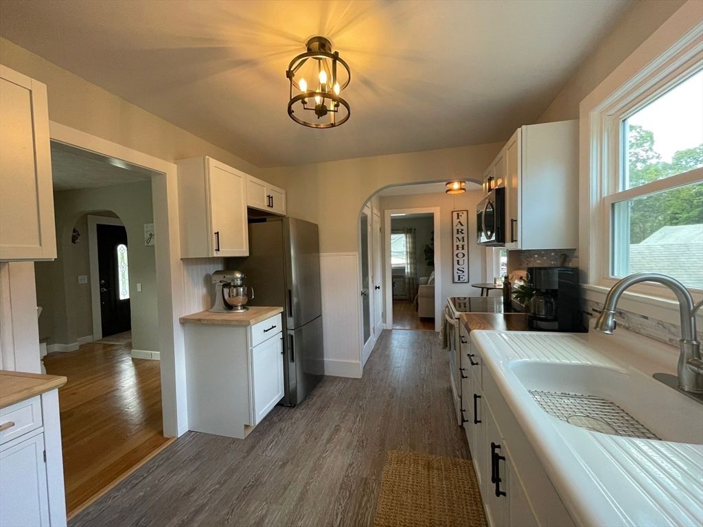 Chandelier, Interior, Kitchen, Tile Countertops, Wood Texture Flooring