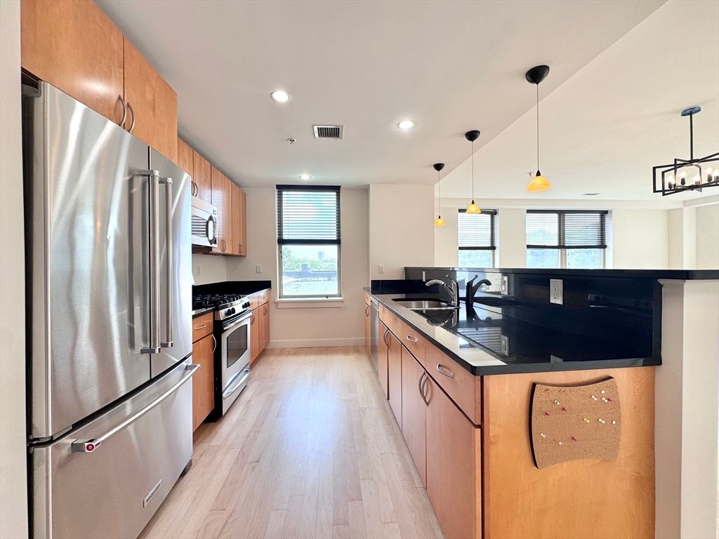 Interior, Kitchen, Pendant Lights, Recessed Lighting, Stainless Steel Appliances, Wood Texture Flooring