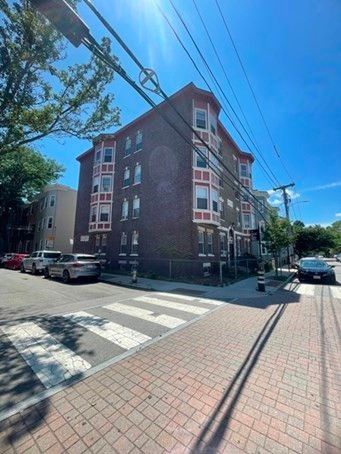 Exterior, Facade, Brick Facade, Condo Building