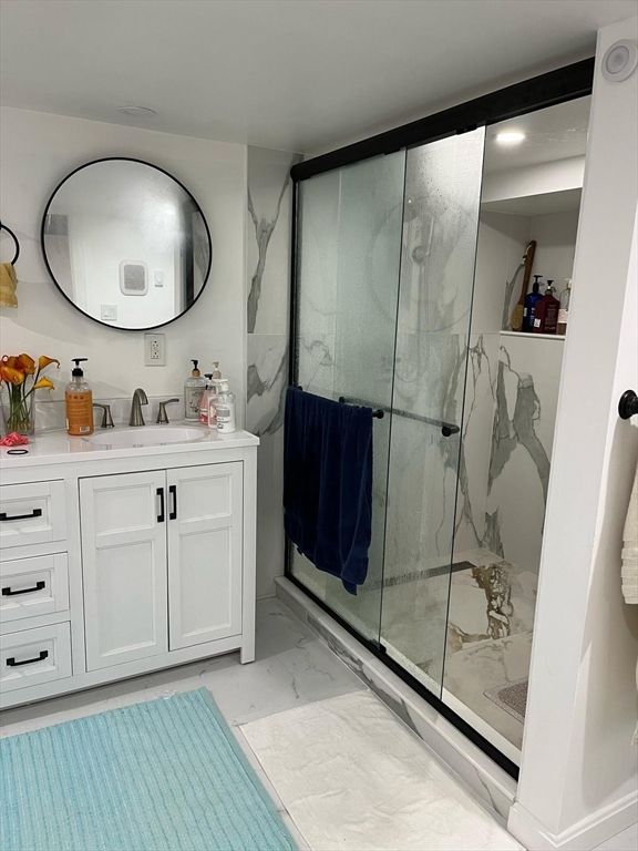 Bathroom, Dual Sink Vanities, Glass Shower, Interior, Marble, Recessed Lighting