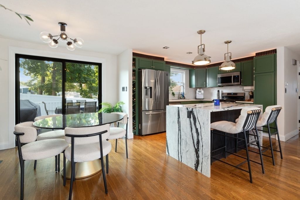 Dining room, Interior, Kitchen, Pendant Lights, Stainless Steel Appliances, Wood Texture Flooring