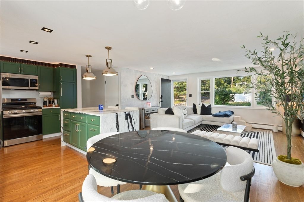 Dining room, Interior, Kitchen, Living room, Pendant Lights, Recessed Lighting, Stainless Steel Appliances, Wood Texture Flooring