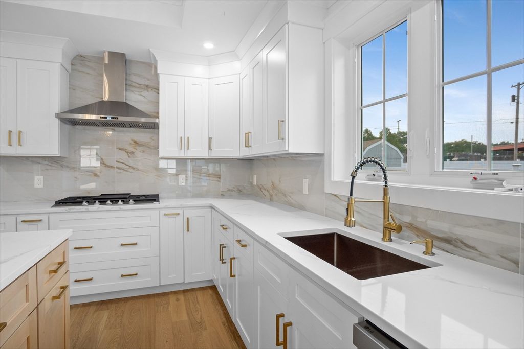 Interior, Kitchen, Marble Walls, Recessed Lighting, Water, Wood Texture Flooring