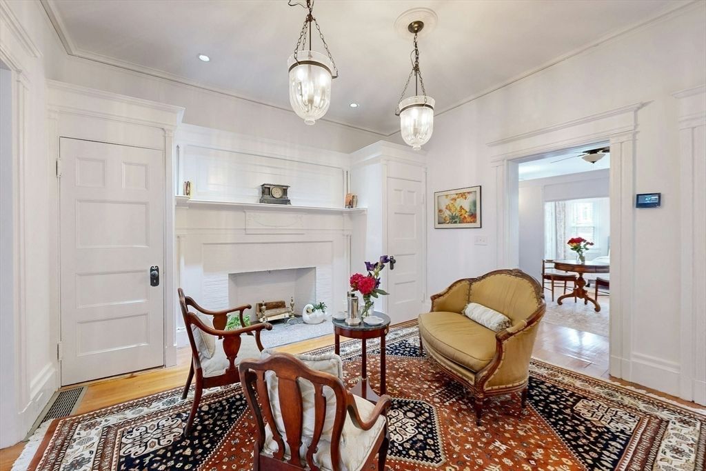 Dining room, Fireplace, Interior, Living room, Pendant Lights, Recessed Lighting, Wood Texture Flooring