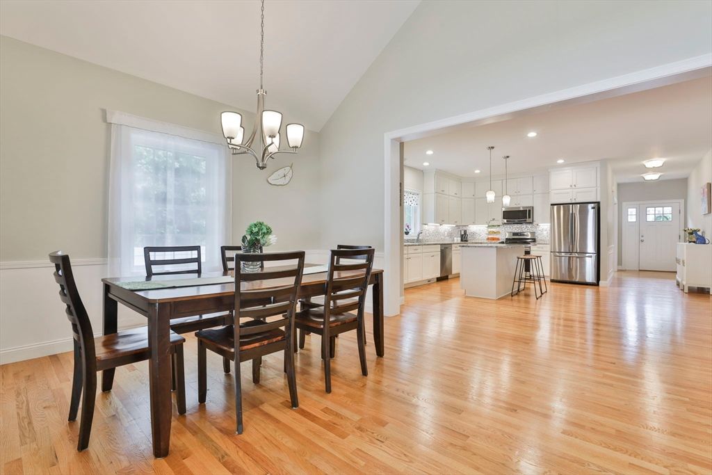 Chandelier, Dining room, Interior, Kitchen, Pendant Lights, Recessed Lighting, Stainless Steel Appliances, Wood Texture Flooring
