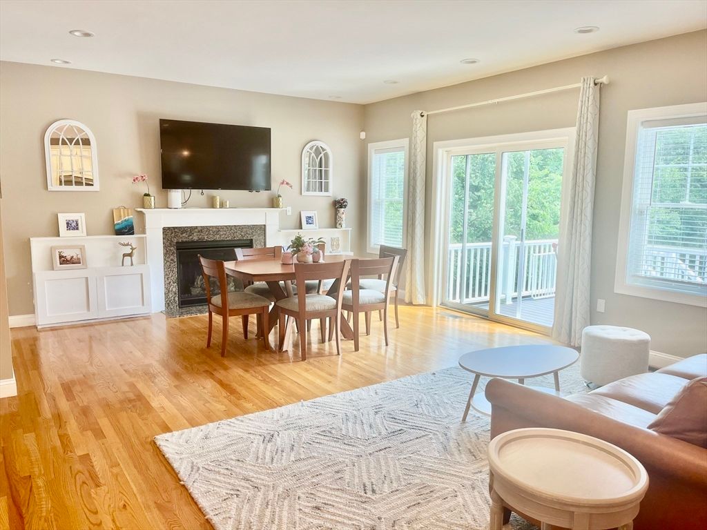Dining room, Fireplace, Interior, Living room, Recessed Lighting, Wood Texture Flooring
