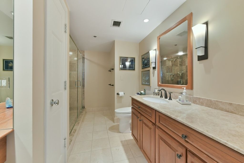 Bathroom, Dual Sink Vanities, Glass Shower, Interior, Recessed Lighting, Tile Countertops