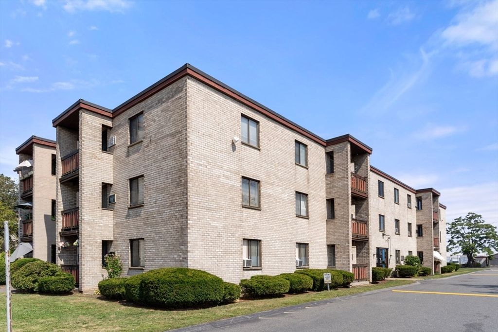 Exterior, Facade, Brick Facade, Condo Building