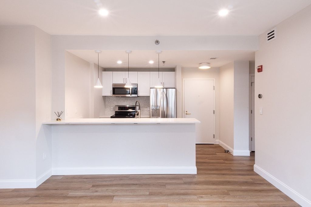 Interior, Kitchen, Pendant Lights, Recessed Lighting, Stainless Steel Appliances, Wood Texture Flooring