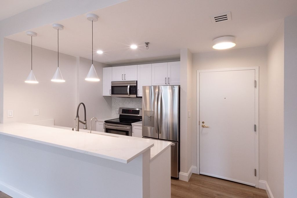 Interior, Kitchen, Pendant Lights, Recessed Lighting, Stainless Steel Appliances, Wood Texture Flooring