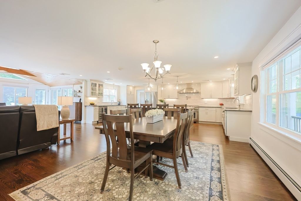 Chandelier, Dining room, Interior, Kitchen, Pendant Lights, Recessed Lighting, Stainless Steel Appliances, Wood Texture Flooring